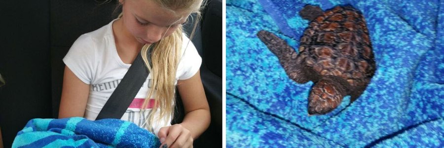 Kylie Campbell caring for Rosie the turtle on her lap (nsri.org.za â€œNewsâ€)